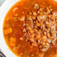 Lentil Soup · Green lentils, carrots, celery, onion and garlic. Served with warm pita.