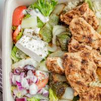 Chicken Kabob Plate · Chicken kabob, grilled vegetables, rice, greek salad and pita.