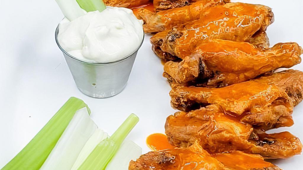 Chicken Wings · Please specify if you would like sauce mixed in or on side.