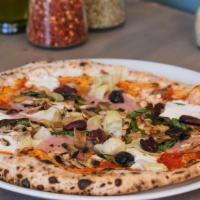 Capricciossa Pizza · Ham, artichokes, mushrooms, kalamata olives, San Marzano tomatoes, fresh mozzarella and basil.