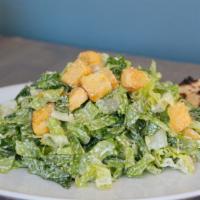 Caesar Salad · With our house caesar dressing. Served with bread.