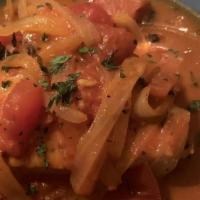 Swordfish Pizzaiola · Sautéed onions, tomatoes and anchovies cooked in a garlic white wine sauce with a touch of m...