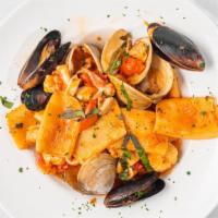 Fra Diavolo Al Scoglio · Shrimp, Scallops, littlenecks, mussels and lobster meat sautéed in a spicy tomato marinara s...