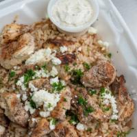 Gyro Or Chicken Gyro Rice · Marinated grilled chicken or beef and lamb on Greek cinnamon rice, topped with feta cheese, ...