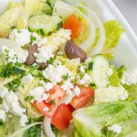 Greek Salad · Spicy. Lettuce greens with tomatoes, cucumbers, banana peppers, kalamata olives, feta cheese...