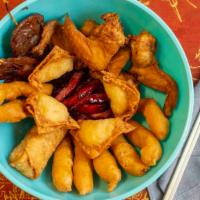 Pu Pu Platter · Served with no rice. Our signature appetizers include chicken fingers, egg rolls, fried shri...