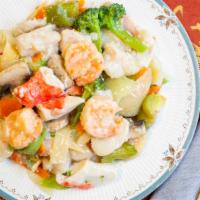 Chef'S Seafood Delight · Crab, Shrimp, fish and scallops stir fried with vegetables in a light sauce.
