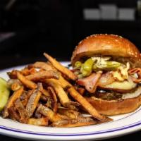 Royal Burger · chuck & brisket blend patty, smoked gouda, bacon, pickled longhots, caramelized onions, spic...