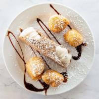 Cannoli  · Delicious tube of fried dough, filled with a sweet, creamy ricotta filling.