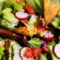 Fattoush Salad · Lettuce, tomatoes, cucumbers, green peppers, radish, onion, parsley, fattoush dressing (oliv...