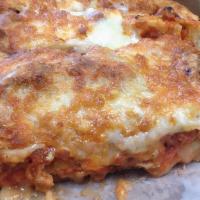Chicken Parm · Breaded crispy chicken, pizza cheese, marinara & ricotta cheese.