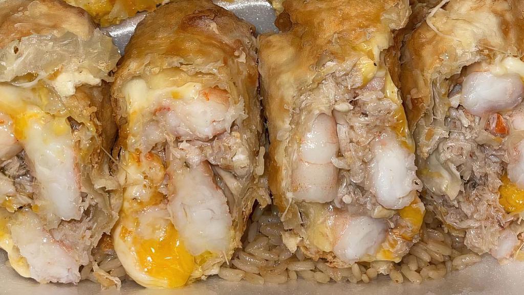 Seafood Rolls · Includes bed of rice.