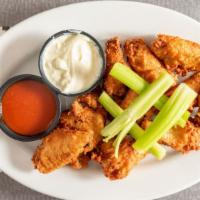 Hot Buffalo Wings · With celery and bleu cheese.