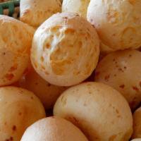 Pão De Queijo (3) · Backed cheese balls.