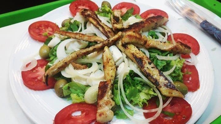 Family Side Salad · Family-sized side salad with romaine lettuce, bruschetta tomatoes, mozzarella and your choice of dressing. Feeds 4-6 people as a side dish