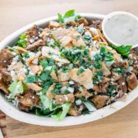 Chicken Caesar Salad · Chicken, Lettuce, Crumbled Queso Fresco, Fresh Chopped Cilantro, Crunchy Crushed Tortilla St...