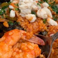 Seafood Jambalaya · Beautifully seasoned with risotto, clams, mussels, shrimp, grilled calamari, Italian sausage...