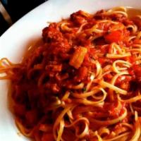 Linguini Bolognese · Ground beef and vegetables in a plum tomato sauce and spices.