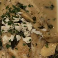 Pan Seared Red Snapper Filet · Pan seared red snapper with artichoke hearts, capers and basil in a white wine sauce topped ...