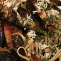 Linguine Pescatore'  · served with mussels, clams, shrimp, crab meat with white sauce OR  plum tomato sauce olive o...