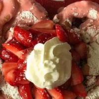 Strawberry Deluxe · Funnel Cake with fresh strawberries and strawberry drizzle.
**Whipped topping and sprinkles ...