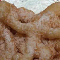 Mini Funnel Cake · Little funnel cake with plain powdered sugar.