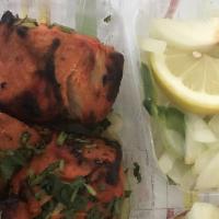 Chicken Tikka · Skewered cubes of chicken breast marinated in yogurt, herbs and spices, and baked in a clay ...