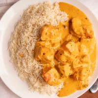 Butter Chicken/ Chicken Makhani · Boneless chicken marinated in herbs and spices, grilled over charcoal and cooked in a creamy...