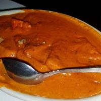 Paneer Makhani · Cubes of fresh homemade cheese stewed in a creamy tomato gravy.