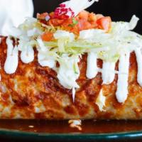 Vegan Wet Burrito · Ancho guajillo salsa, vegan crema, and radish