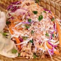 Rainbow Salad · cabbage tossed in our sweet 
chili vinaigrette dressing 
topped with peanuts and veg spring ...