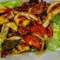 Steak Salad · flank grilled steak  on a bed of veggies
in spicy lime juice, fish sauce (moderate spicy)