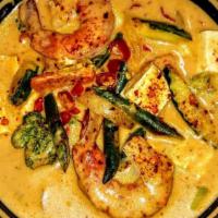 Massaman Curry · rich coconut milk curry with mixed veggies topped with peanuts