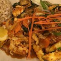 Thai Basil  · chicken and scallops with Thai basil and mixed veggies in savory garlic chili sauce with sid...