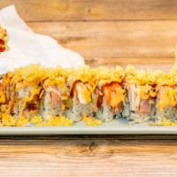 Lion King Roll · Inside: tempura shrimp, crab meat, thinly sliced crab, spicy mayo, sweet glaze, tempura flak...