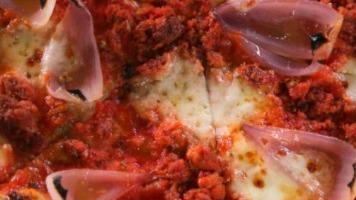 Salsiccia Full · DOP san marzano tomatoes, sausage. mushrooms, mozzarella, parmigiano, basil, E.V.O.
