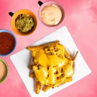Cheese Me Fries · Idaho potato fries cooked until golden brown, topped with melted cheese and garnished with s...