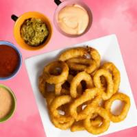 Onion Rings · Onions dipped in a light batter and fried until golden brown.