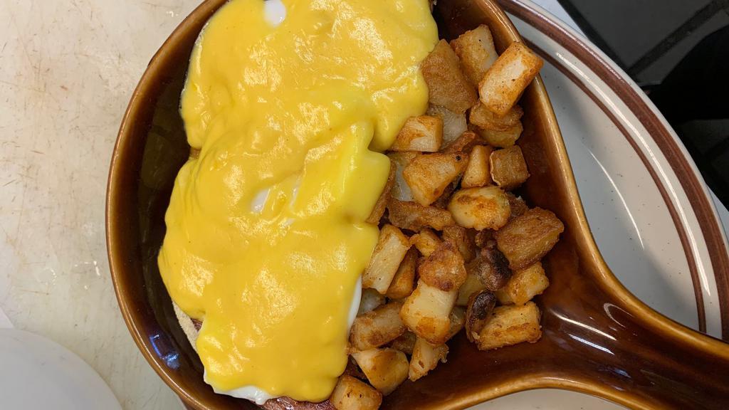 Corned Beef Hash Benedict · English muffins topped w/ hash, 3 eggs & hollandaise sauce. served w/ home fries