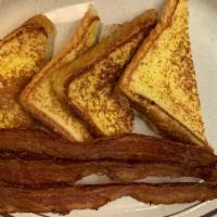 French Toast · Extra thick, golden brown.