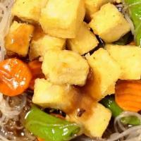 Pan-Seared Tofu · Crispy tofu stir fry with carrots and sugar snap peas.  Served with your choice of white ric...