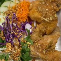 Chicken Wing Platter · Two whole chicken wings (fried or baked) served with white rice and fresh herbs and vegetabl...