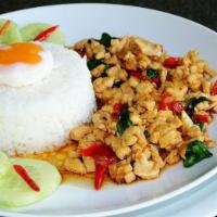 Krapow · Ground Chicken or ground beef with onion, red & green peppers in Krapow sauce served with wh...