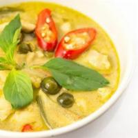 Green Curry · Red & green pepper, string bean, bamboo slice and fresh basil leaf in green curry.