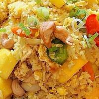 Mango Fried Rice · Fried rice, fresh ginger, eggs, peas, carrot, scallions, onions, mangoes, curry powder with ...
