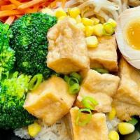 Crispy Tofu Rice Bowls · Crispy Tofu, Aji Ramen Eggs (Soft Boiled seasoning eggs), bean sprout, corn, broccoli, carro...