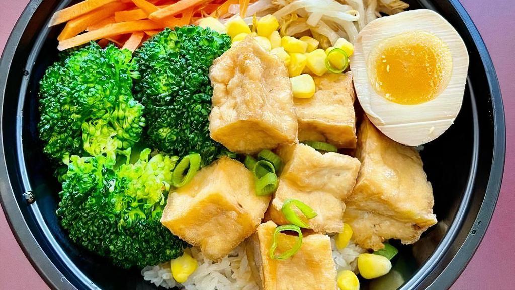 Crispy Tofu Rice Bowls · Crispy Tofu, Aji Ramen Eggs (Soft Boiled seasoning eggs), bean sprout, corn, broccoli, carrot, and scallion.