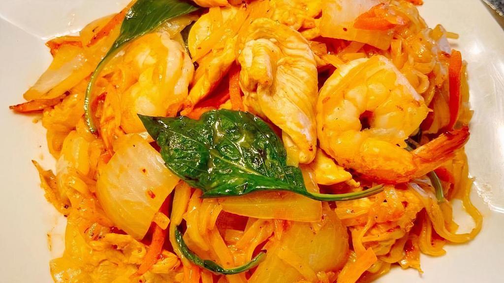 Thai Spicy Noodle · Stir-fried rice noodles with onion, carrot, red pepper, green pepper, and basil leaf in Thai Spicy Sauce.
