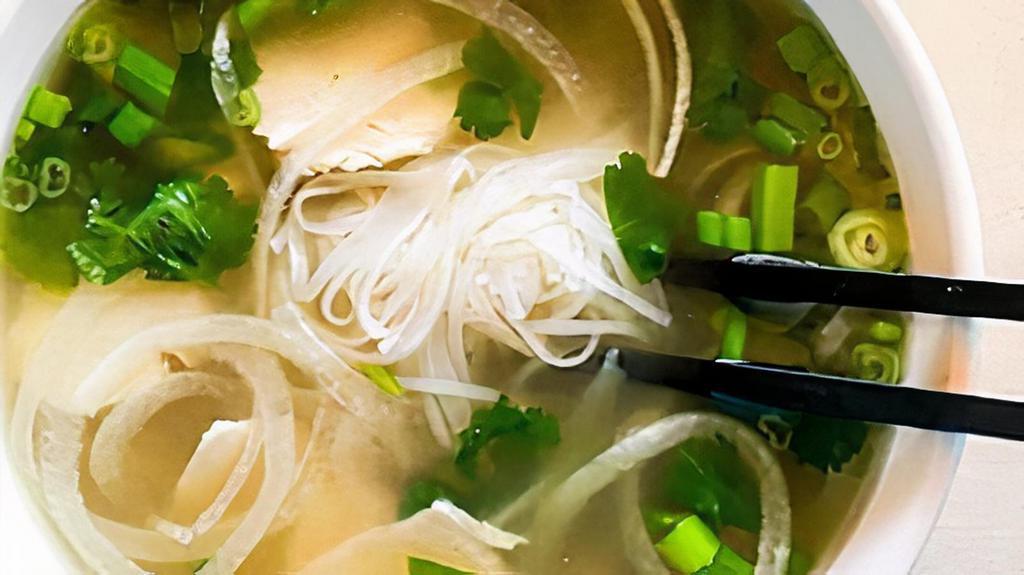 Pho Chicken Noodle Soup · Rice noodle with chicken in chicken broth Vietnamese style topped. with onion, scallion and cilantro.