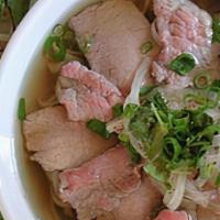 Pho Beef Combination · Rice noodle with rare beef, brisket, and beef ball in homemade beef broth Vietnamese style t...